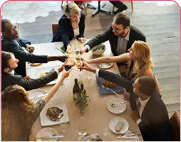 Group get-together celebration at Kyra Party Hall with spacious seating, food, and a lively atmosphere